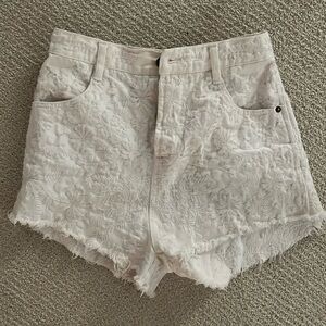 White, free people shorts.